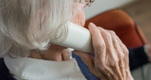 Elderly woman on phone