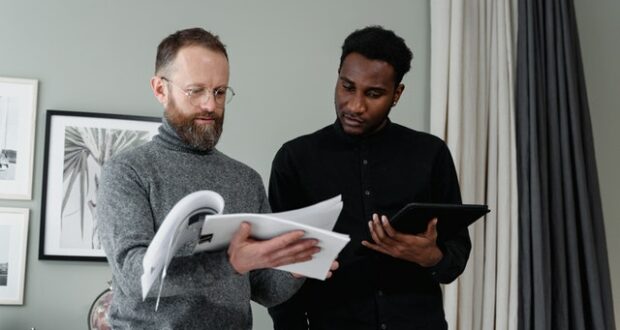 2 men reading