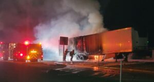 Firefighters battle big rig fire on 5 freeway