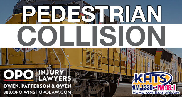 A Union Pacific Engine travelling left. "Pedestrian Collision" overlaid in white capital letters with the KHTS and OPO logo -- train pedestrain collision traffic crash