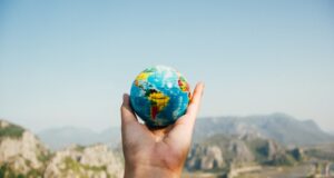 Globe in hand