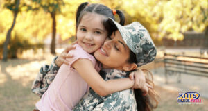 female veteran soldier with child stock 110923