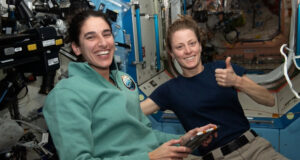 (Nov. 11, 2023) — NASA astronauts and Expedition 70 Flight Engineers Jasmin Moghbeli, left, and Loral O’Hara, work inside the Destiny laboratory module following the successful docking of the SpaceX Dragon cargo spacecraft to the International Space Station. (NASA)