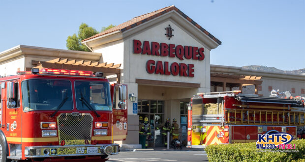 Firefighters inspecting Barbeques Galore