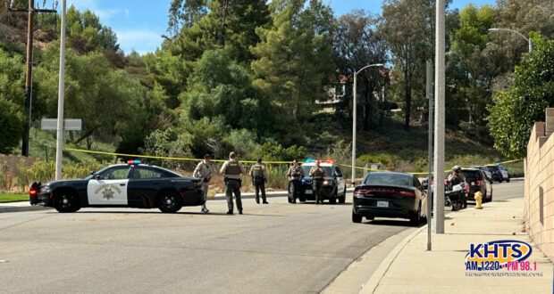 Deputies close down a street