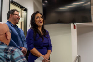 Senator Suzette listens to Mayor Bill Miranda talk about their accomplishments together.