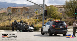 A car overturned in the middle of the intersection