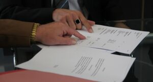 SSI Benefits lawyer assisting client with application.