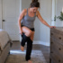 Woman recovering from a concussion using a dresser for balance while getting dressed, illustrating a subtle change in everyday function after concussion.